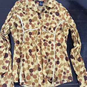 Green top with brown polka dots!